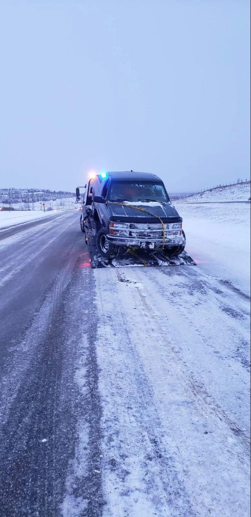 Roadside Assistance in Calgary 01 - Car jammed in the middle of icy road.